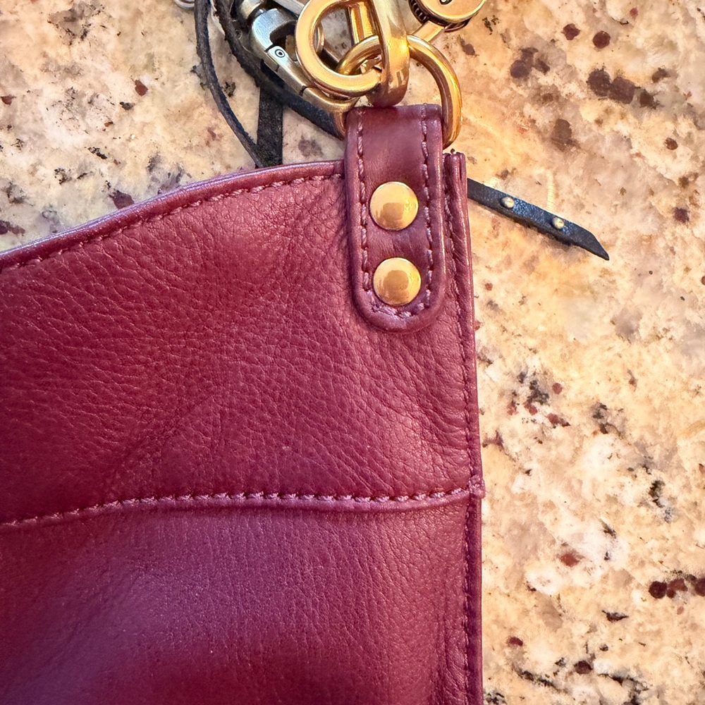 HOBO Burgundy Leather Shoulder Bag with Black Tassel and Gold Hardware - Picture 7 of 9